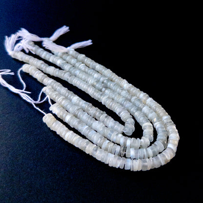 Handmade jewellery components featuring White Rainbow Moonstone wheel gemstone beads in 6mm size.