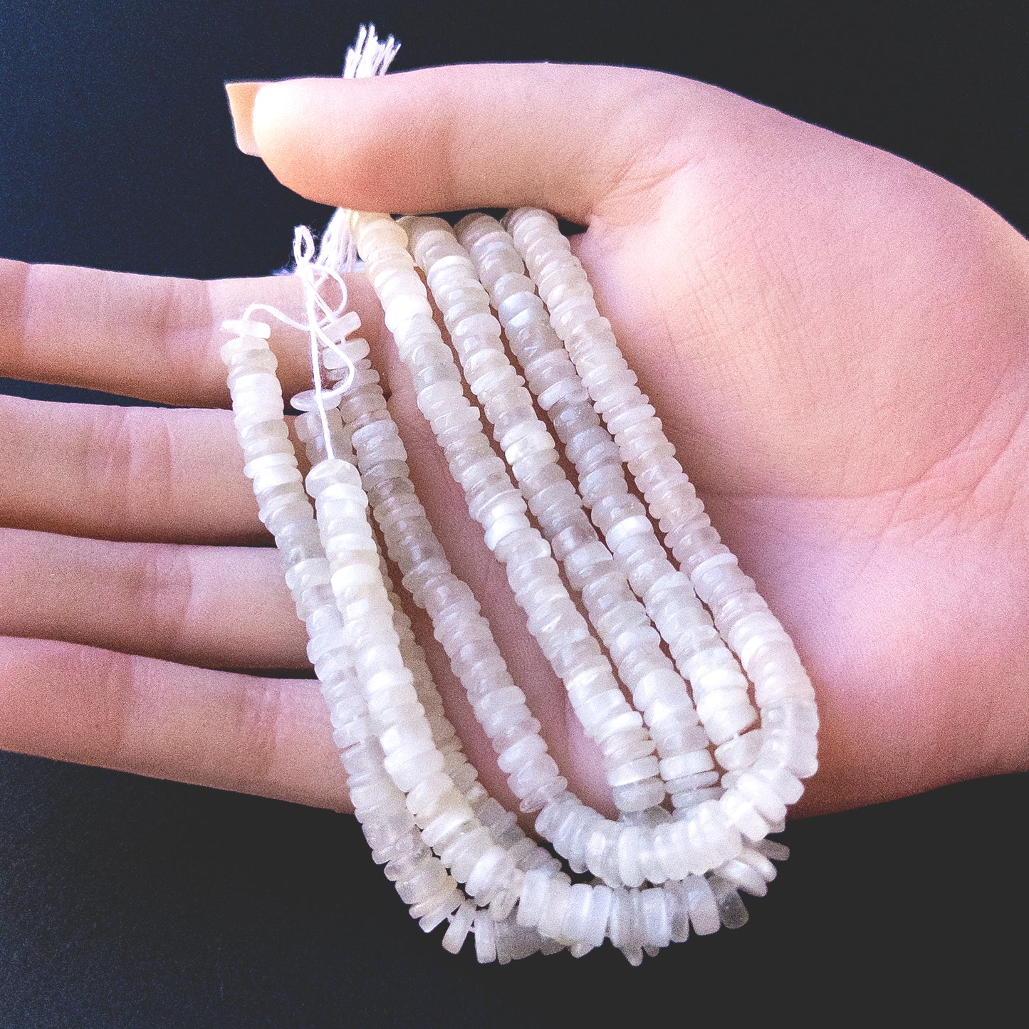 High‑quality White Rainbow Moonstone wheel beads with radiant white‑blue shimmer perfect for gemstone bead jewellery making.