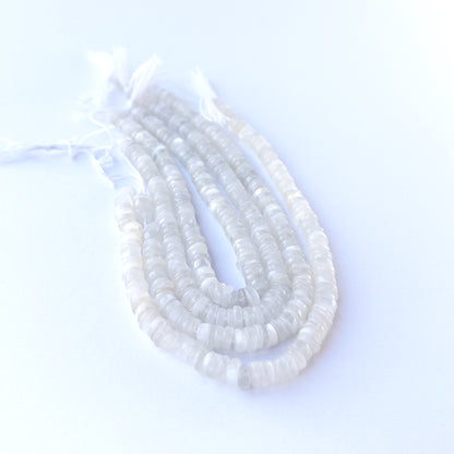 White Rainbow Moonstone wheel beads with radiant white‑blue shimmer perfect for gemstone bead jewellery making.