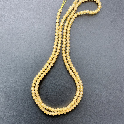 Natural gemstone beads in Yellow Chalcedony, 2.2mm size, ideal for delicate DIY jewellery designs.