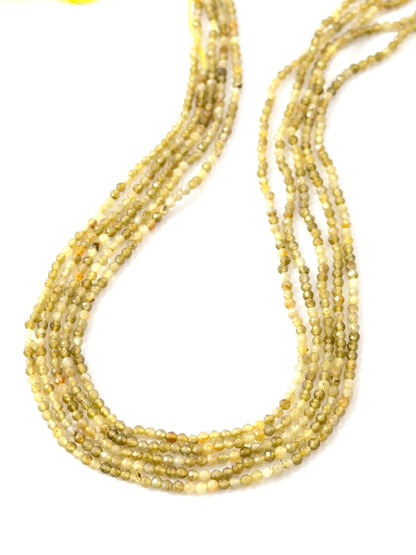 - 2.4mm faceted Yellow Opal rondelle beads on a 33cm strand for jewellery making.