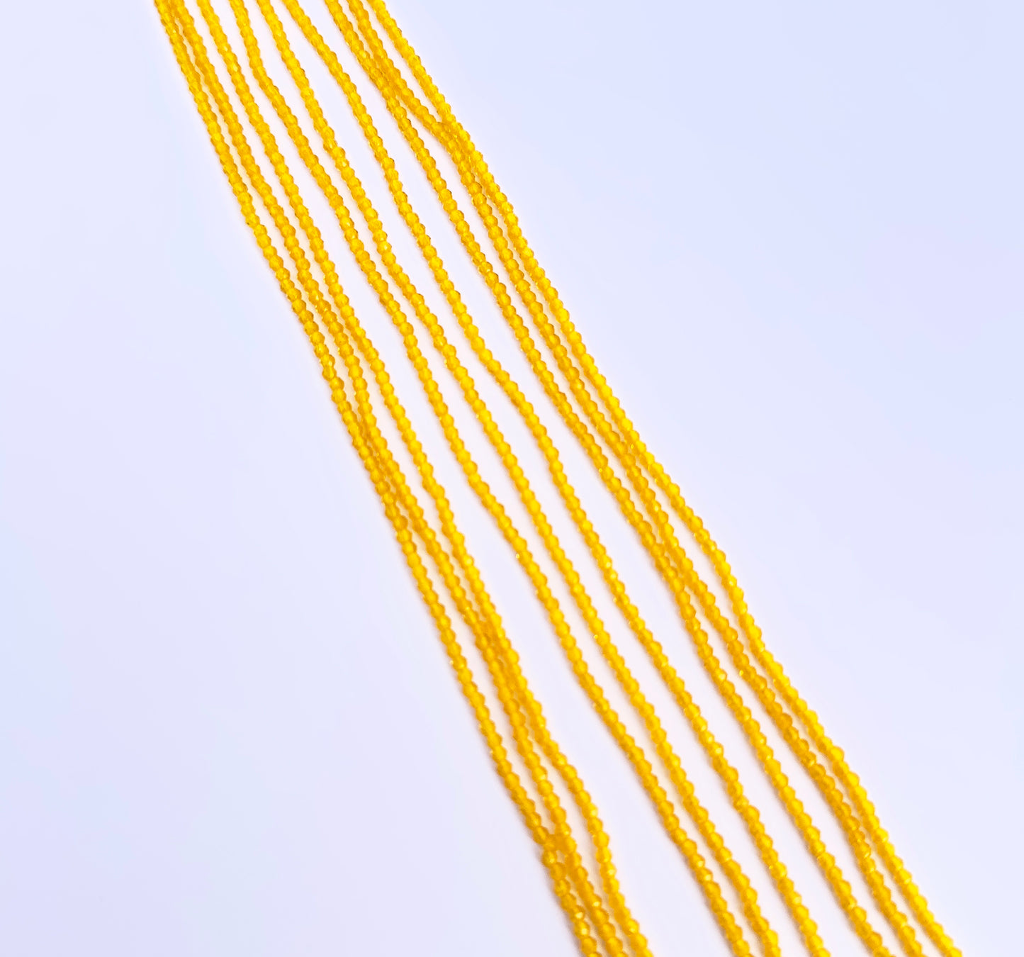 Handmade jewellery components featuring Yellow Quartz faceted rondelle beads.