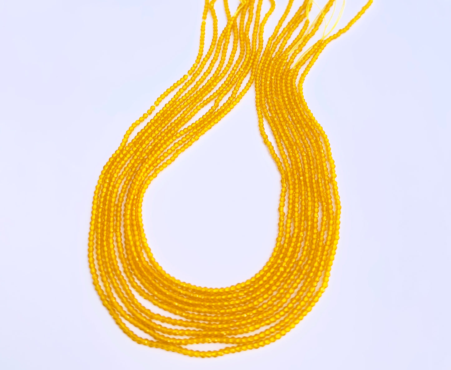 Yellow Quartz faceted rondelle beads in soft golden tones strung on a 35cm strand.