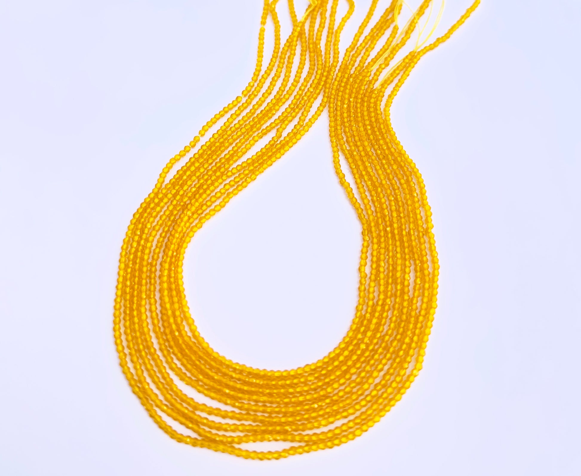 Yellow Quartz faceted rondelle beads in soft golden tones strung on a 35cm strand.